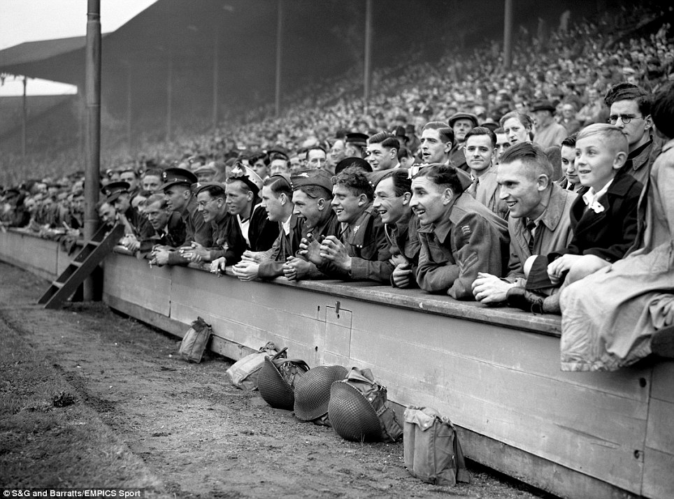 Fig: Servicemen of the United Kingdom watching a wartime match between England and Scotland in 1943